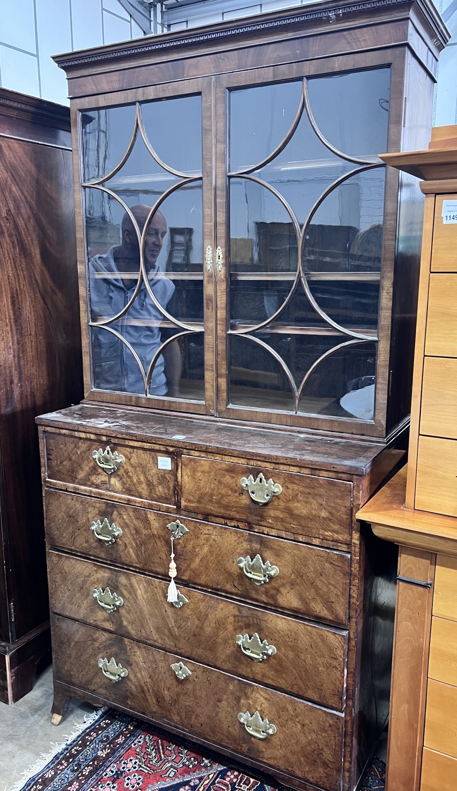 A George III mahogany bookcase on chest, width 100cm, depth 54cm, height 204cm